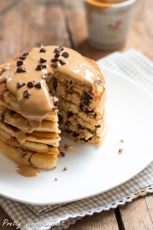 Thick peanut butter pancakes loaded with chocolate chips and drizzled with melted, warm peanut butter. | prettysimplesweet.com