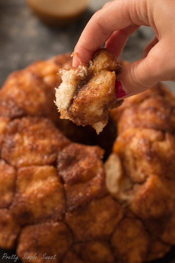 Monkey bread is made of fluffy dough balls coated in brown sugar and cinnamon, and it tastes even better than cinnamon rolls! | prettysimplesweet.com