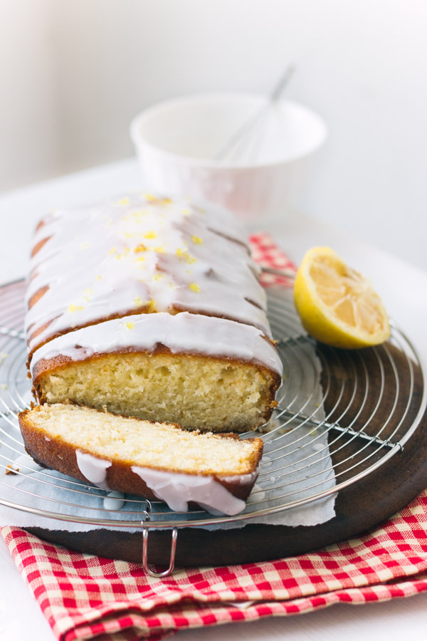 Perfect Lemon Tea Cake with lemon syrup and a powdered sugar lemon glaze.