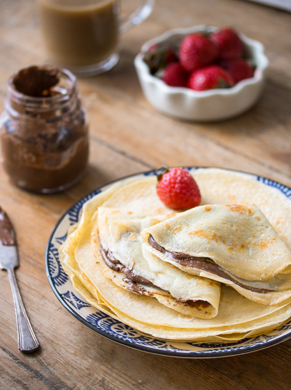 Delicious dessert crepes with pudding 