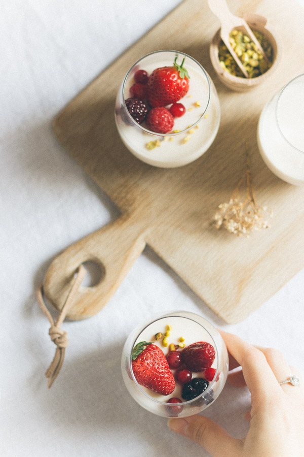 Downward view of Perfect traditional panna cotta in glass cups, super quick and easy to make! 