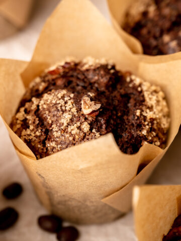 Delicious chocolate muffins made with espresso and topped with crunchy sugar and nut toppings.