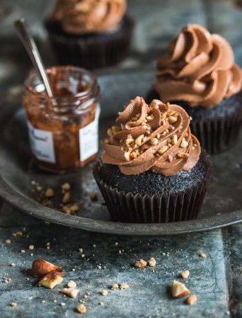 Moist chocolate cupcakes with a creamy dreamy Nutella frosting. | prettysimplesweet.com