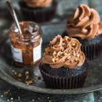 Moist chocolate cupcakes with a creamy dreamy Nutella frosting. | prettysimplesweet.com