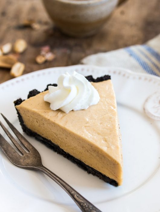 Dreamy, creamy classic peanut butter pie made of chocolate cookie crust and a fluffy peanut butter mousse filling. | prettysimplesweet.com