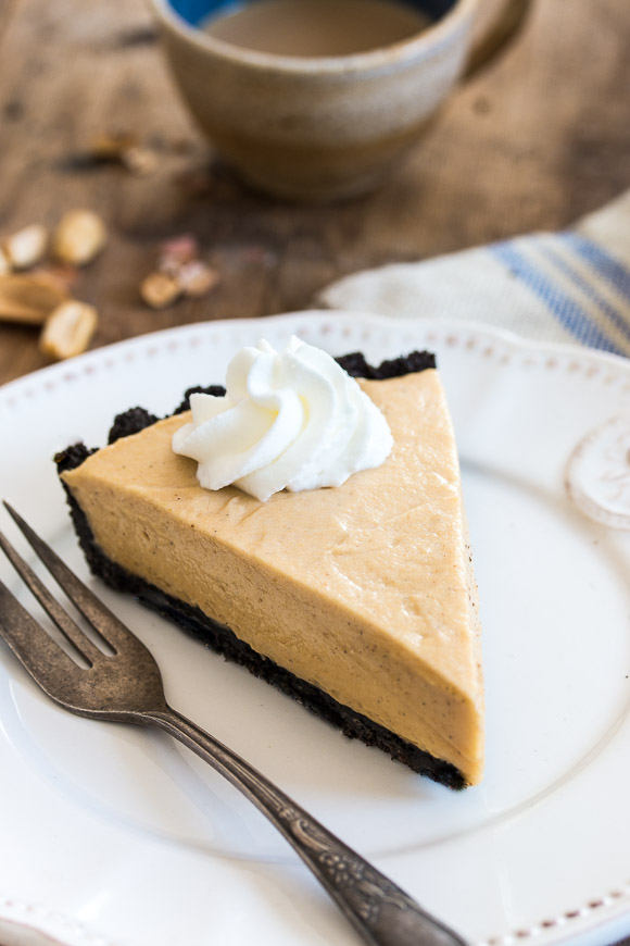 Dreamy, creamy classic peanut butter pie made of chocolate cookie crust and a fluffy peanut butter mousse filling. | prettysimplesweet.com