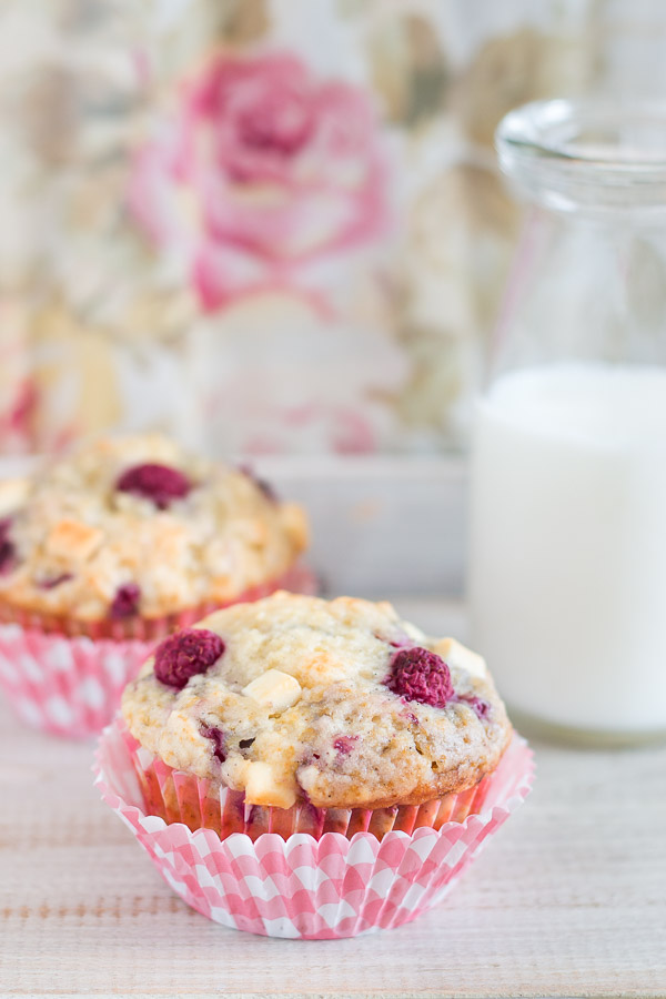 Moist and fluffy raspberry and white chocolate muffins - a heavenly combination! | prettysimplesweet.com