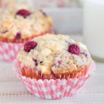 Moist and fluffy raspberry and white chocolate muffins - a heavenly combination! | prettysimplesweet.com