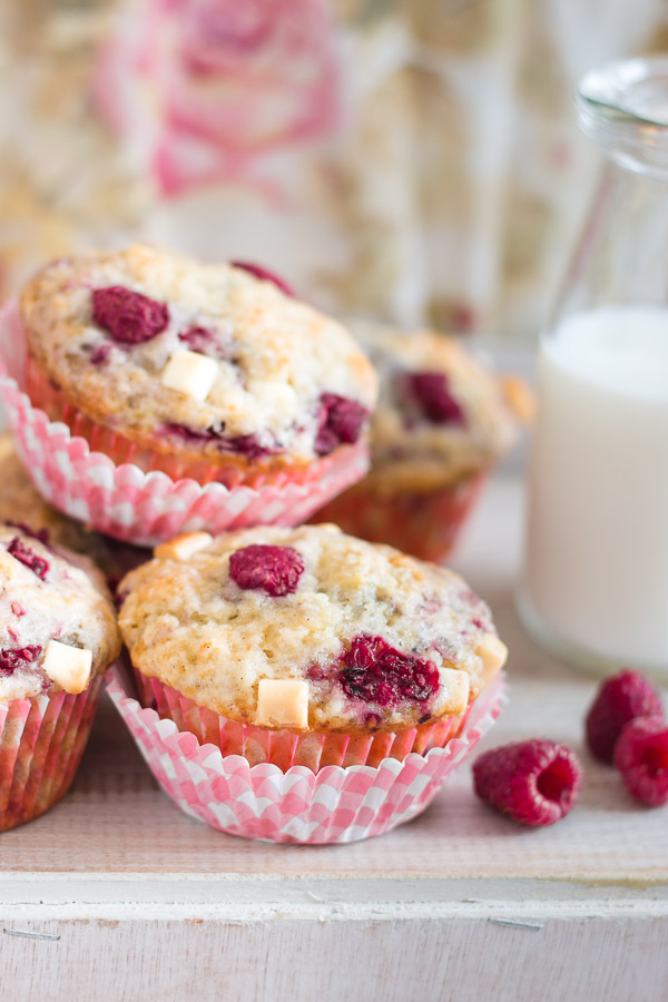 Moist and fluffy raspberry and white chocolate muffins - a heavenly combination! | prettysimplesweet.com