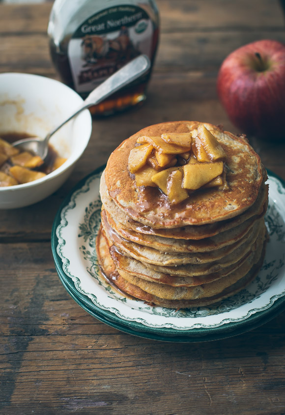 Apple cinnamon pancakes topped with buttery, tender apple pieces | prettysimplesweet.com