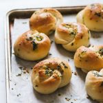 Soft and fluffy garlic knots perfectly browned on the tops and edges.