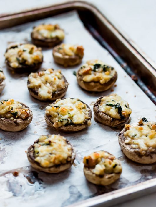 Addictive mushroom bites filled with cheeses, nuts, and herbs. They make the perfect brunch appetizer!