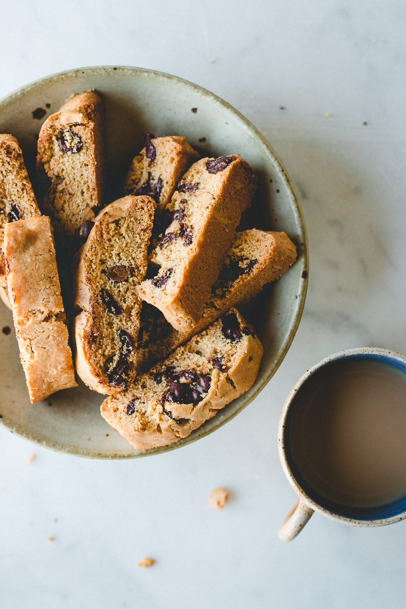 Chocolate Peanut Butter Biscotti with cup of hot chocolate.