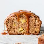 Moist bakery-style apple bread glazed with a thick and crunchy caramel icing.