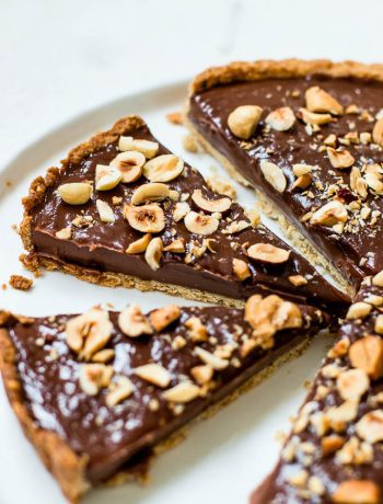 The best Nutella tart with hazelnut crust. Creamy and chocolatey with a rich chocolate hazelnut filling.