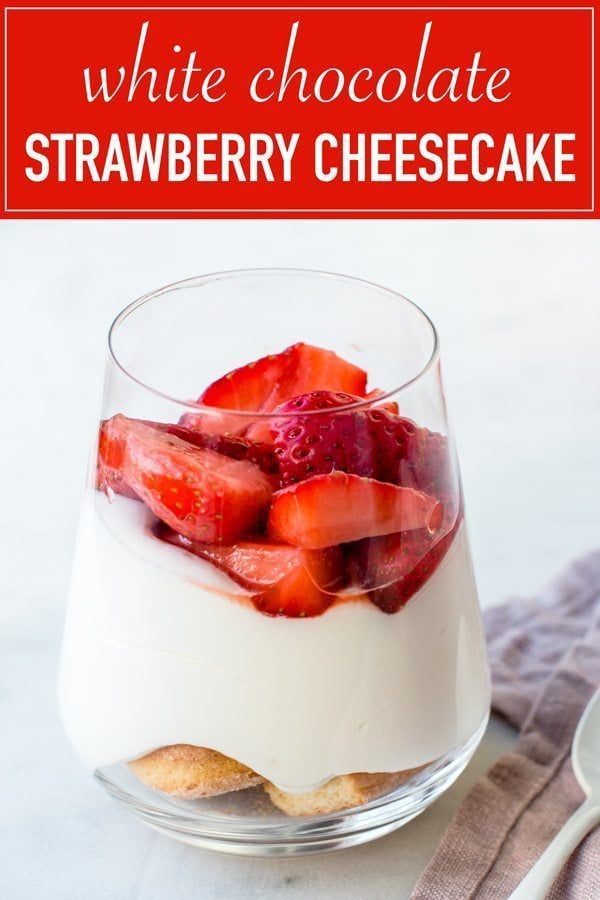 Strawberry white chocolate cheesecake in a jar. Delicious creamy white chocolate cream cheese mousse with fresh strawberries.