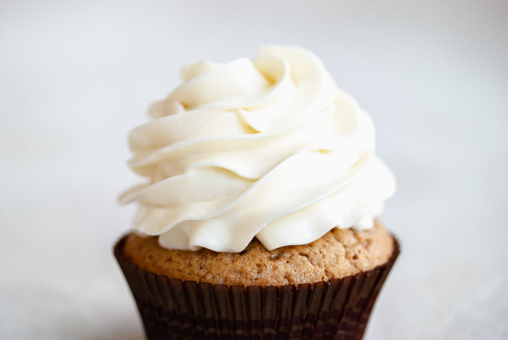 white chocolate swiss meringue buttercream on cupcake