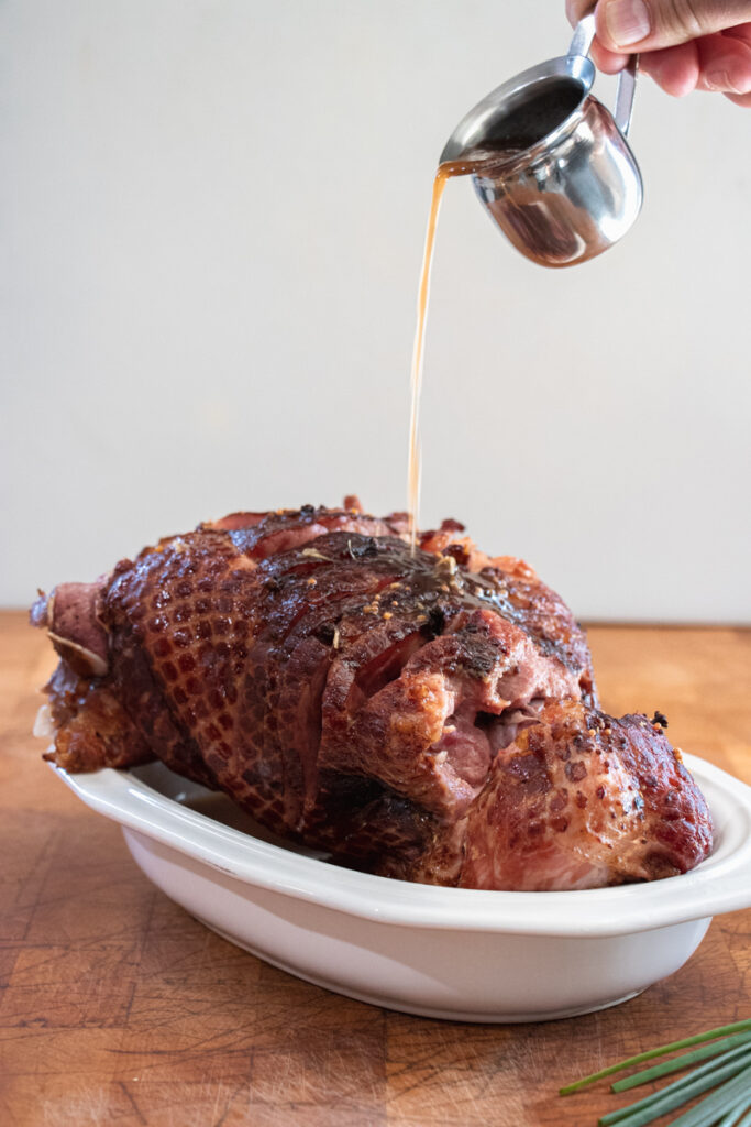 Holiday Baked Ham with Charred Pineapple Bourbon Glaze