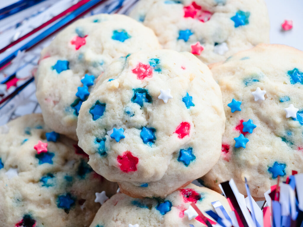 Sugar cookies with red, white, and blue star-shaped sprinkles