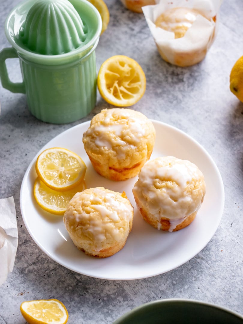 plate of lemon muffins with glaze