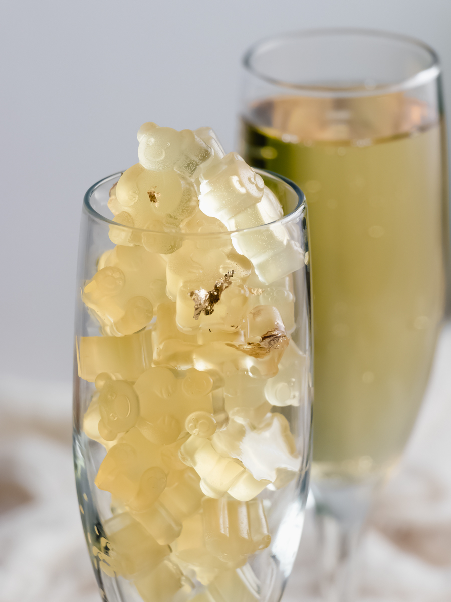 champagne glass filled with champagne gummy bears