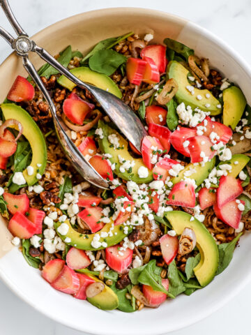 Gorgeous pink Pickled rhubarb salad loaded with fresh veggies and rhubarb vinaigrette dressing.