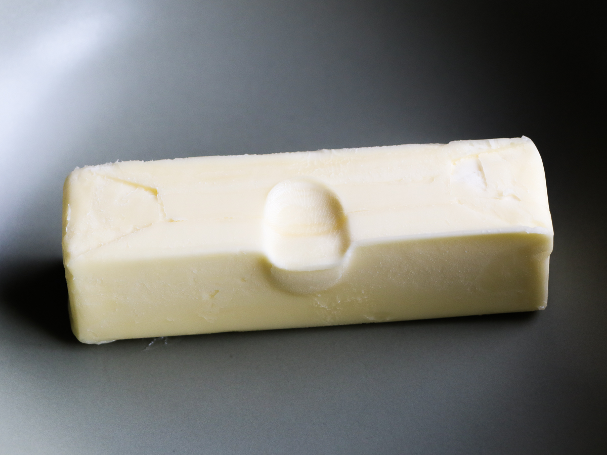 An example of room temperature butter: warm enough to make a fingerprint indent.